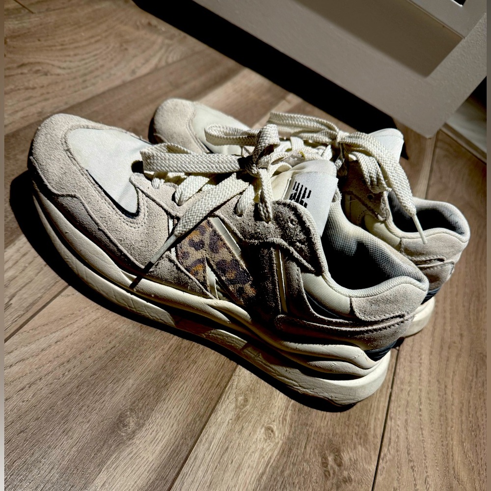 Gently worn New Balance 5740 leopard sneakers, size 9.